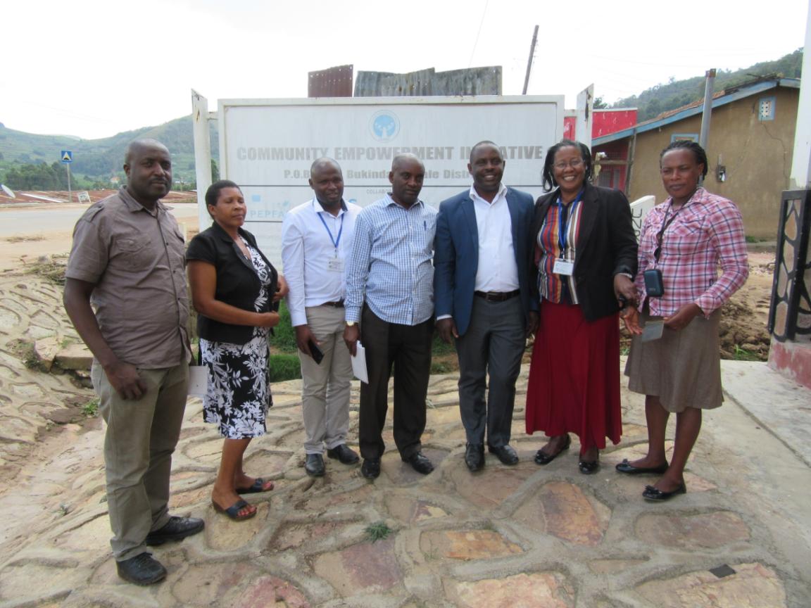 COMEI staff with Rukiga District NGO Monitoring Committee at their office in Muhanga town Council, Rukiga District